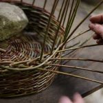 Trailing rod woven into next gap