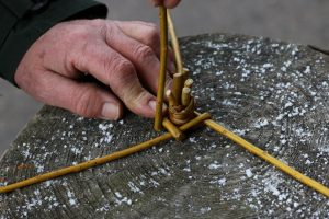 Weaving rod crosses over two