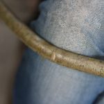 Cut rod, bent around knee