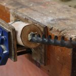 Make sure the auger is in line with the wood