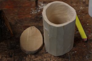 Cut base to size with axe