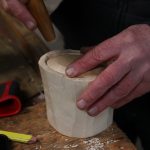 Tap base into position