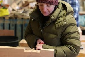 Caroline chiselling out a rebate