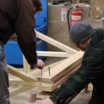 Pete and Dan fitting the bed