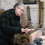 Jacquie sawing a rebate